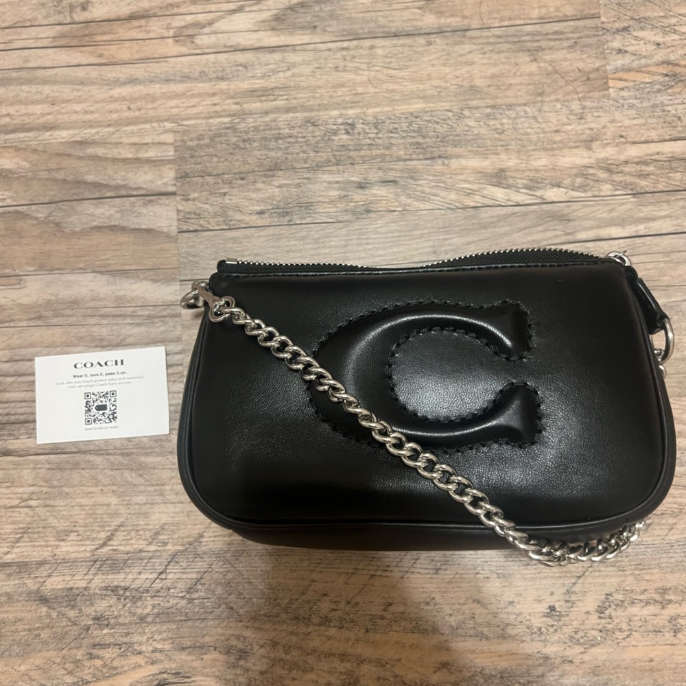 Brand new Coach wristlet pochette
